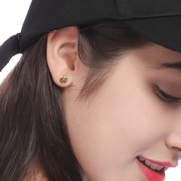 Goldtone Twisted Stud Earrings - Picture 2 of 4